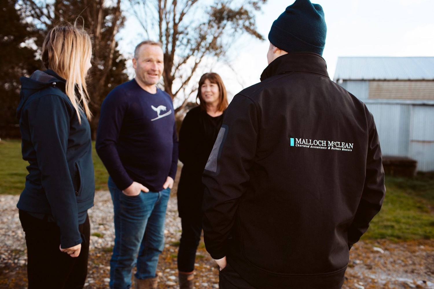 Malloch McClean team members having a meeting with a client, discussing how we can help them make more money, pay less tax and get ahead faster.